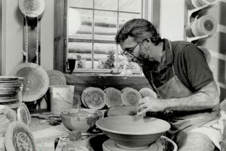 Potting around: Geoffrey Stevens, working away in The Elora Pottery Shop, was the instigator of the Elora Studio Tour, taking place Oct