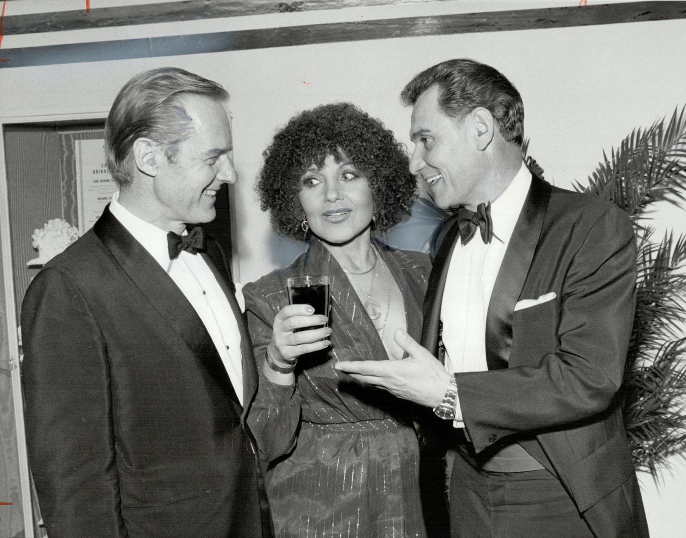 Top trio: Singer Cleo Laine chats with Alan Marchment (left) president of the Toronto Symphony board of directors, and Lorne Lodge, IBM Canada, at Arcadian Court dinner dance