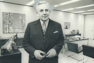 Banker Allen Lambert, standing in his T-D Centre office, heads an investigation of government spending