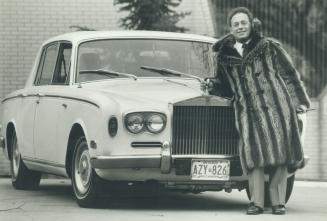Man of style: Millionaire Lastman cruised into the mayor's office driving his then-trademark white Rolls-Royce, above, back in 1972.