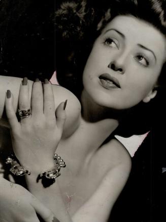 Perhaps few at a glance can spot the gypsy in this beauty is none other than Gypsy Rose Lee of burlesque of literary fame, too, for she has published a best-selling book