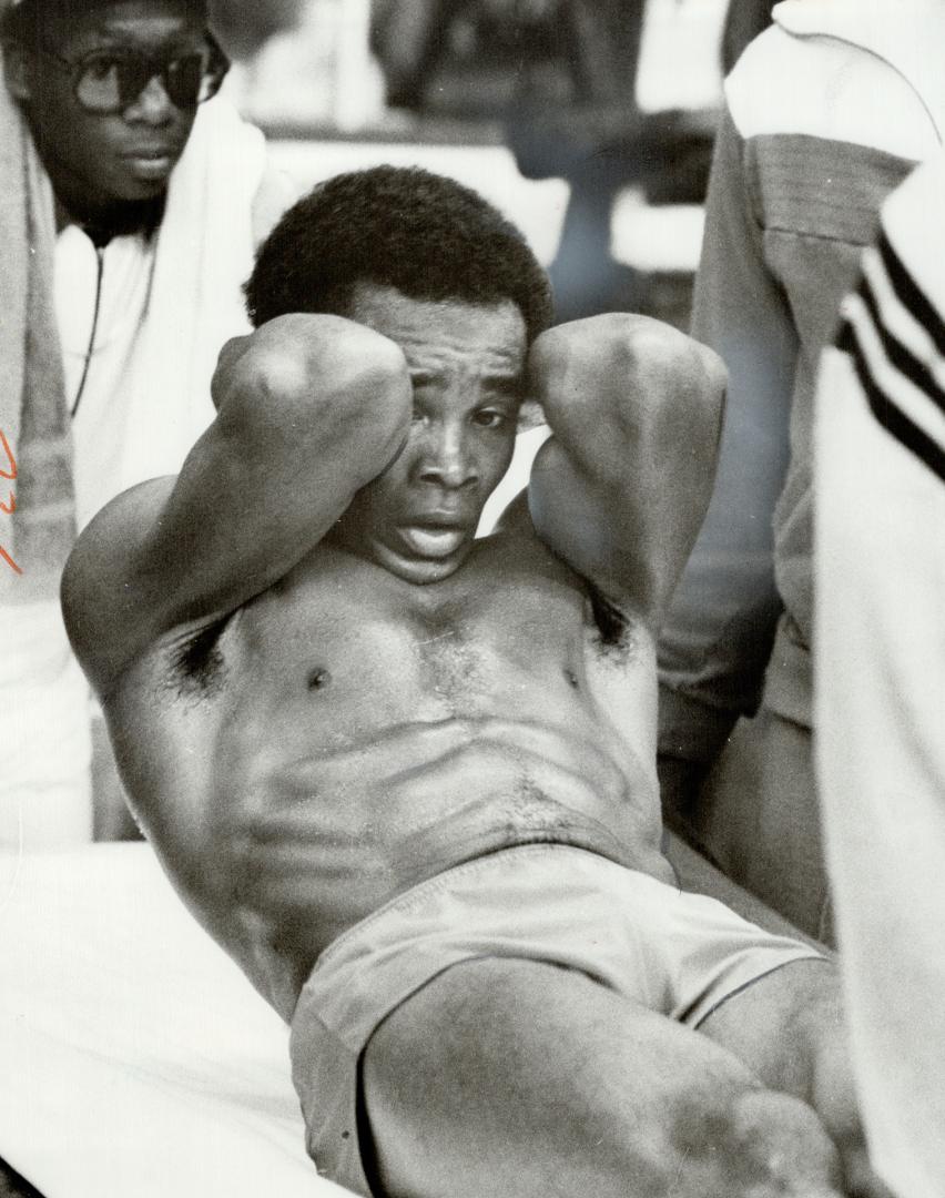 Last-minute preparations: Sugar Ray Leonard uses his final day of training to do sit-ups