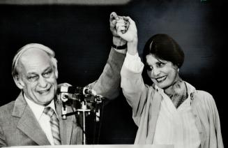 Moment of triumph: Rene Levesque and his wife Corrine raise their arms in triumph after the 1981 provincial election in Quebec