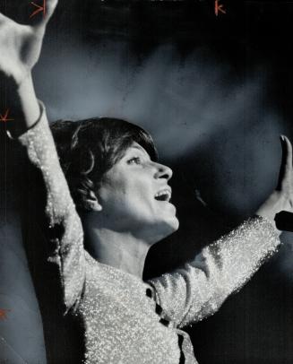 Monique Leyrac led in music. She now lives in France with her husband and daughter
