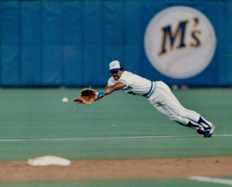 Diving defence: Blue Jay second Nelson Liriano can't quite get to this ball up the middle off the bat of Cleveland's Willie Upshaw in the ninth inning of last night's game at Exhibition Stadium