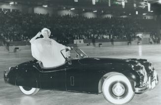 Dame Vera Lynn is chauffeured around the Exhibition Place Coliseum arena after her final performance yesterday.