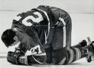 Minutes Later, the Big M Crumbles to ice in pain. Leaf ace suffered charley horse from crash into the boards
