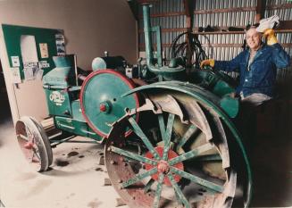 Wally Biernacki on a Rumley Oil Pull tractor Pickering Village, Ajax, Ontario