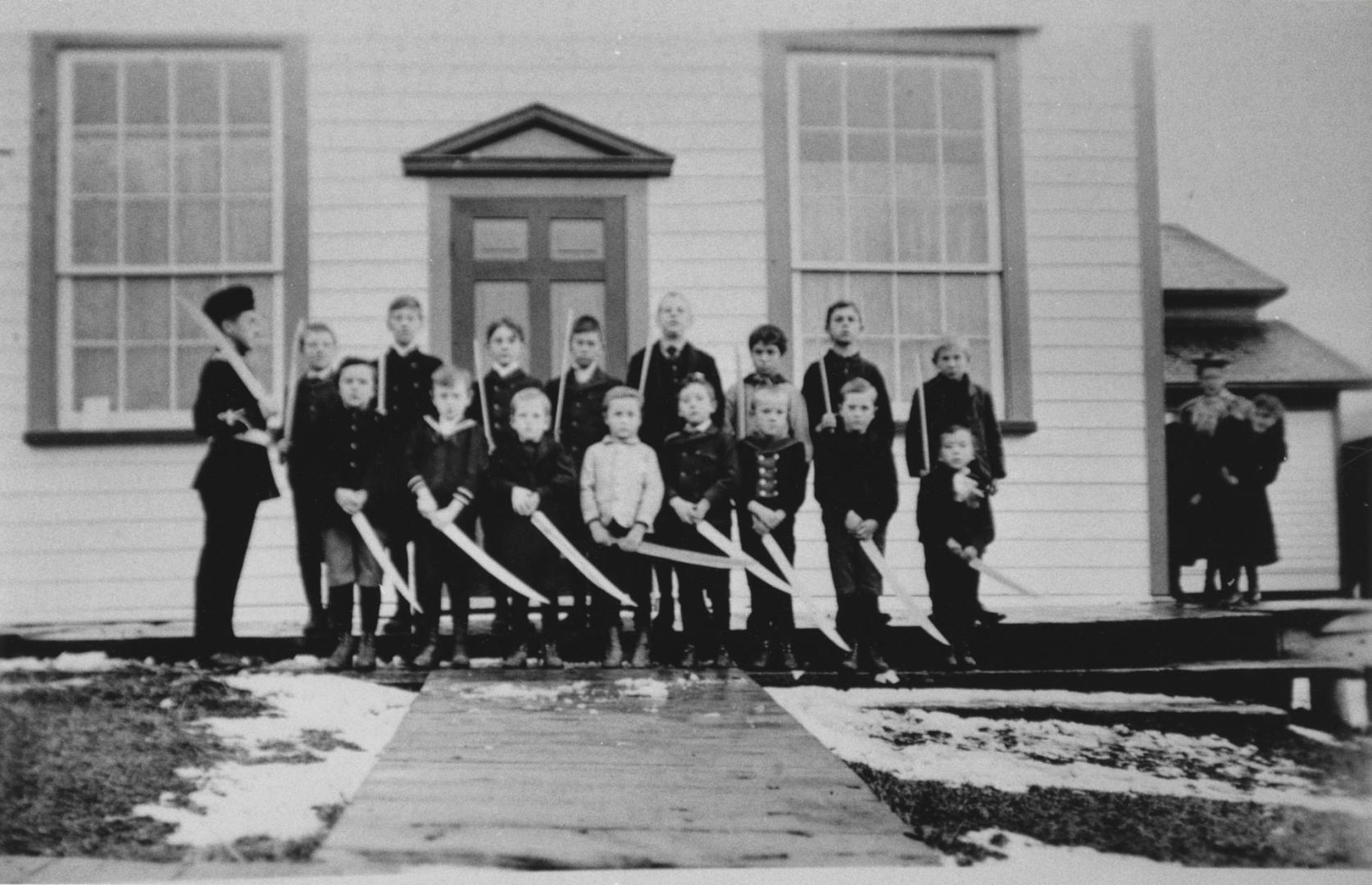 Boys outside Temperance Hall in Kettleby, Ontario