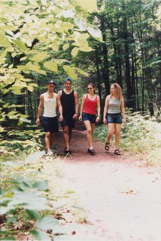 Ernie Guarino, left, Franco Cardile, Maria Cecala and Lucy Tavernese enjoying the trails at Boyd Conservation Area. Vaughan, Ontario
