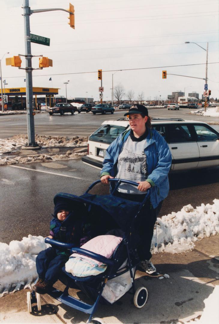 Joyce Power, Rayla (1 month), and Jesse (2). Hurontario Street and Steeles Avenue. Brampton, Ontario