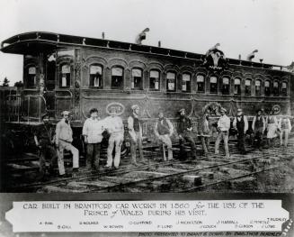 Workmen posing by the rail car they built for the use of the Prince of Wales during an official visit. Brantford, Ontario