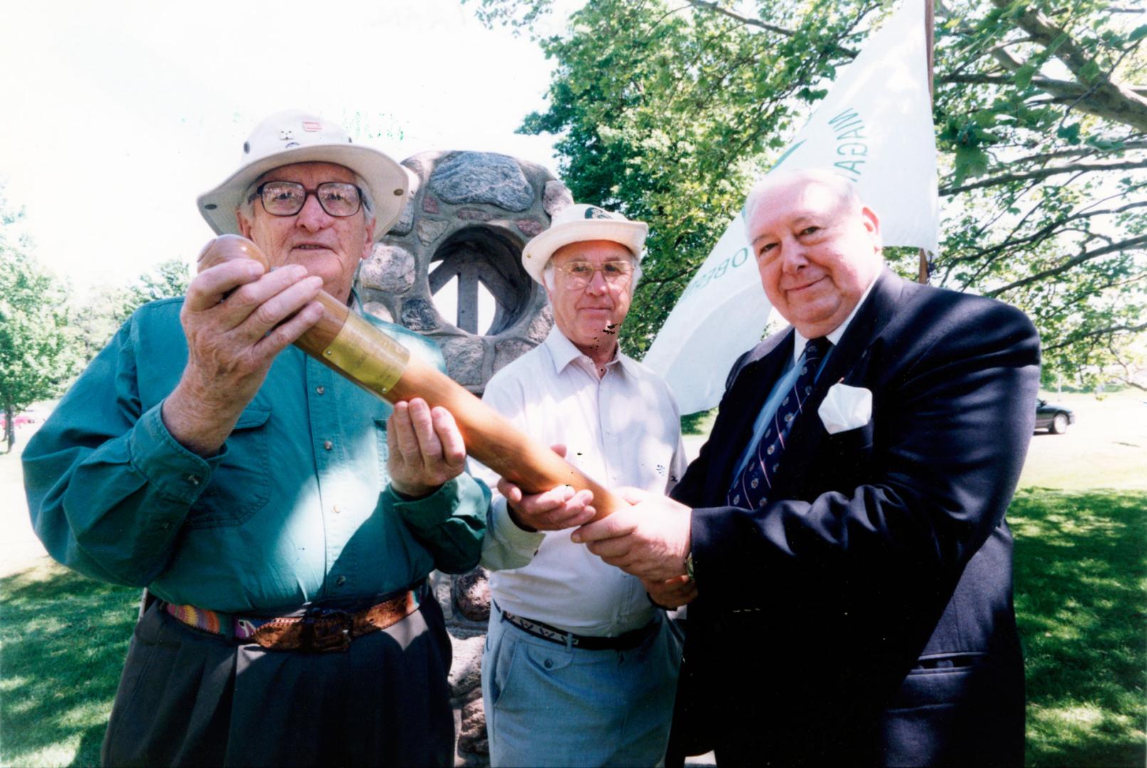 Ray Lowes, Phil Gosling, and Norman Pearson hold up the Bruce Trail baton. Bruce Trail, Ontario