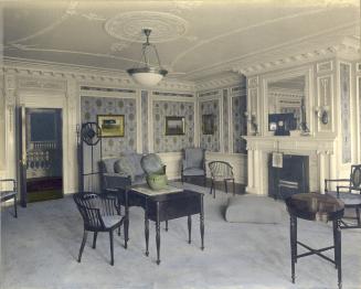 Image shows an interior of a parlour.