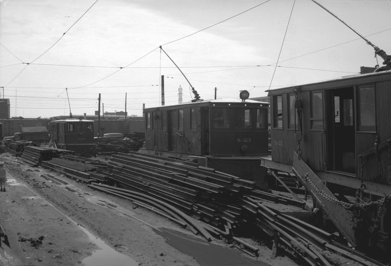 T.T.C., #s S-21, S-23 & S-24, sweepers, being scrapped at George St. yard, looking southwest across Esplanade E
