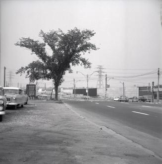 Lakeshore Boulevard W., looking northwest at Kingsway South, showing construction of Gardiner Expressway bridge over Kingsway South