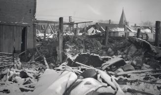 Canadian General Electric Co., warehouse, Pacific Avenue, west side, betwest Annette & Dundas Streets, aftermath of fire of 4 January 1952, looking southeast from rear