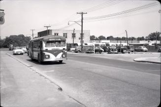 Hollinger Bus Lines, bus #75, on Woodbine Avenue, app