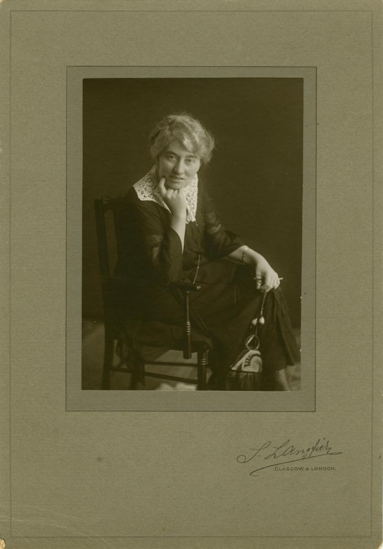 Mabel Adamson in seated pose