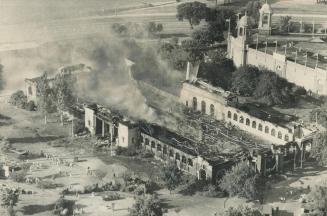 Burned-out shell of the International Building at the Canadian National Exhibition is all that s left of one of this year s most popular exhibits - an(...)