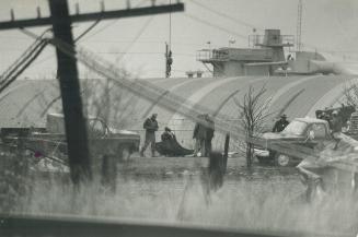 The problem was chlorine. Deadly chlorine leaking from a punctured tanker. The solution was a patch - one hoisted by block and tackle and made of stee(...)