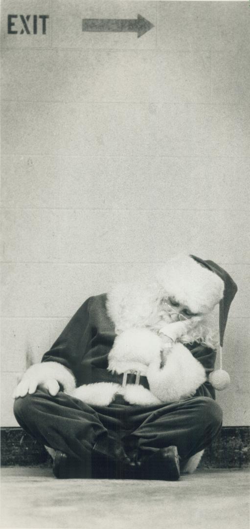 Seasonal Work, but exhausting, so Fairview Mail's Santa finished with a well-deserved nap