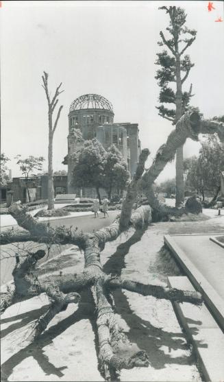 Hiroshima Dome, surrounded by dead trees, is only building preserved to show the bomb's effects