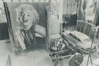 American icons: U. S. exhibition at Montreal included this gigantic Marilyn Monroe blow-up and postwar taxi. People argued for months about this pavilion