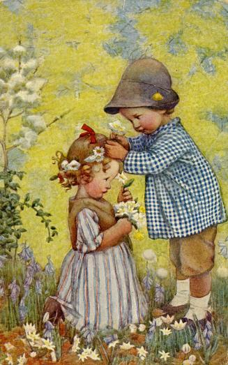 Boy and girl making floral wreath