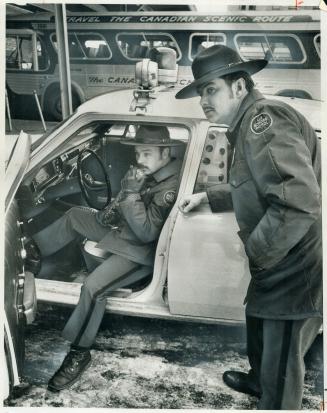 U.S. border patrol agents Ron Chandler (left) and Pete Larrabee check the bus station in Buffalo in their search for aliens entering the States illega(...)