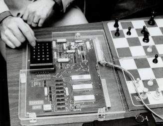 Hank Bordan playing chess against mini computer