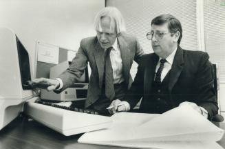 Technical director Rainer vonKonigslow, standing, workds with lan Macclaughlin, using Ware's intelligence language system