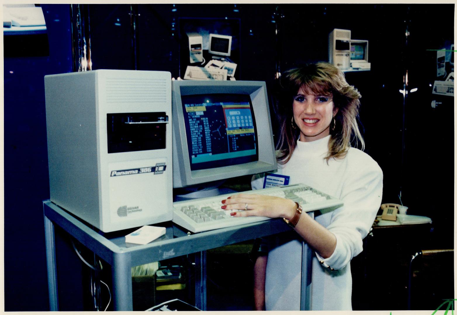 New software: Debbie Benchimol demonstrates Microsoft's Windows software on the Ogivar computer