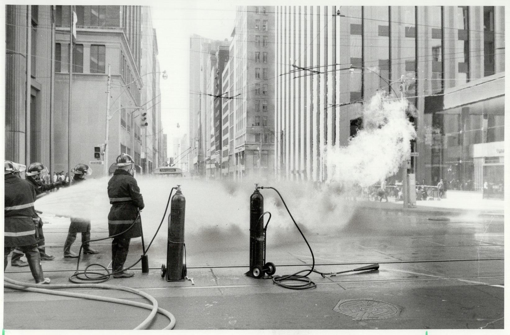 A workman climbed out of a manhole with his clothes in flames when a short circuit in electrical equipment apparently ignited methane gas in a manhole(...)