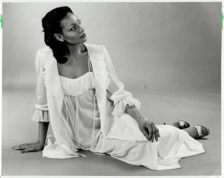 Softly romantic: Candelight colored peignoir set, right, with sheer detailing is $65 in lustre linen nylon tricot
