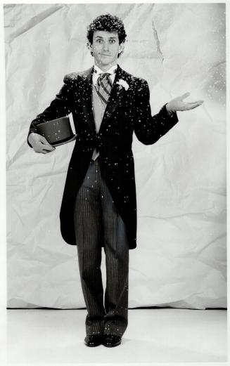 Very formal: Oxford gray cutaway tailcoat, striped trousers, wing collar shirt and ascot rent for $75 at Classy Formal Wear, top hat, $20, gloves, $3
