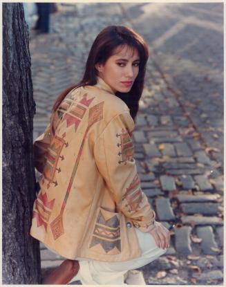 Large photo: Toffee-soft leather jacket with stencilled Navajo motif, photographed in Central Park, New York