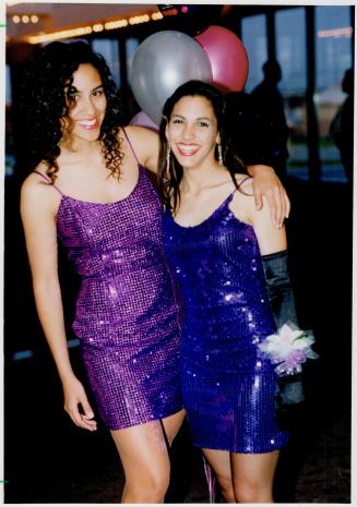 Sue-Anne Lee, left, and Joanne Dinardo, Grade 12 students at Cardinal Leger, have a passion for purple sequins