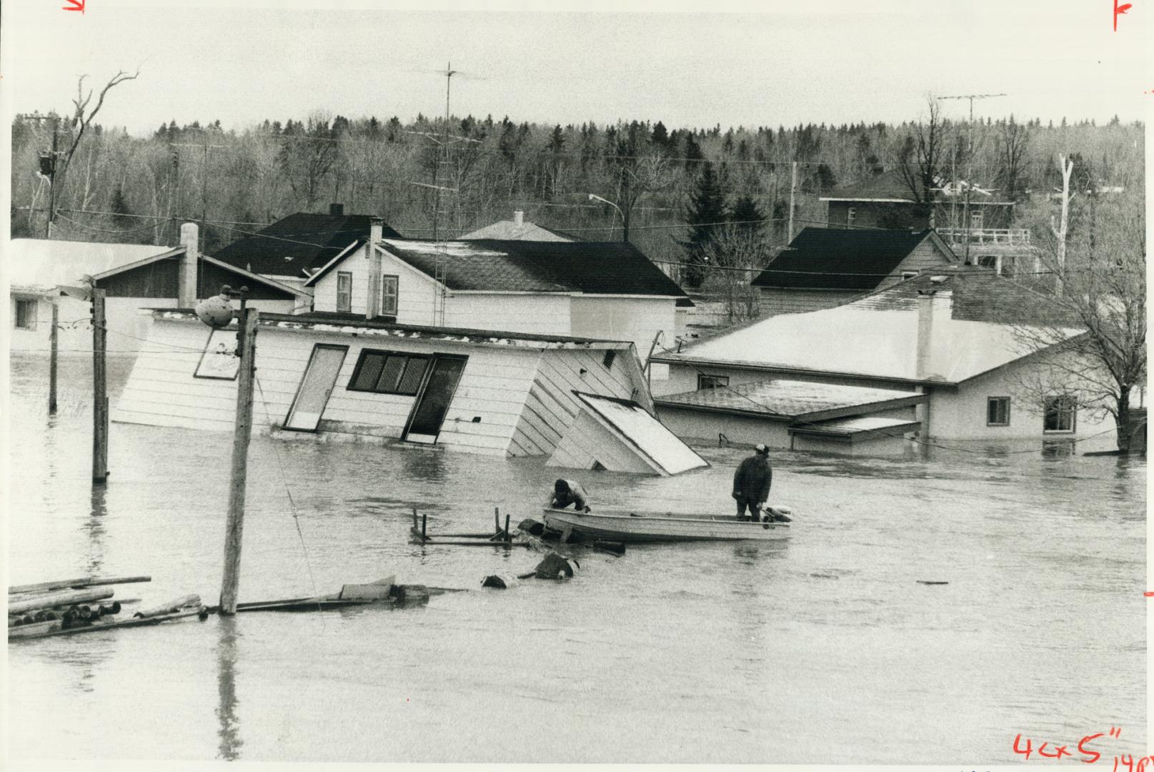 Surging Sturgeon River wrecked this home in the Ontario town of Field