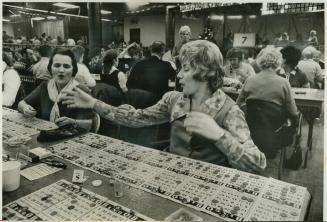 Edna Griscuks enjoys Ontario's most popular form of lotteries-bingo-two or three or four nights a week, usually with her mother-in-law, left. Mrs. Gri(...)