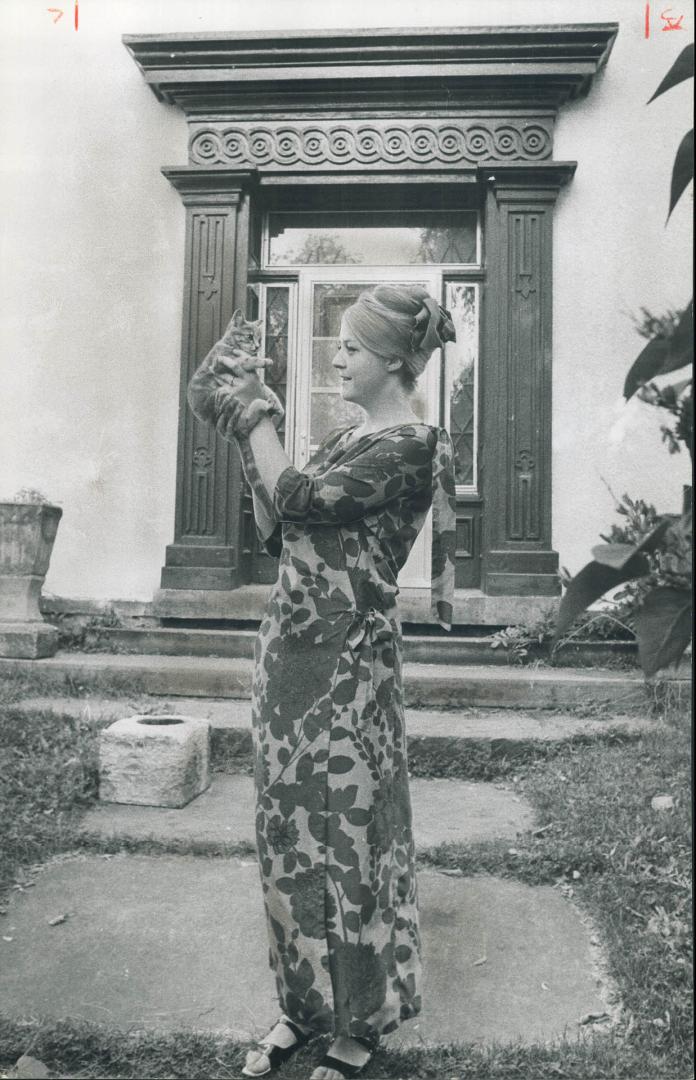 A Grecian Doorway. The most beautiful feature of the old home is a Grecian doorway, so Helen emphasized this point by giving it a dark brown stain to show it off well