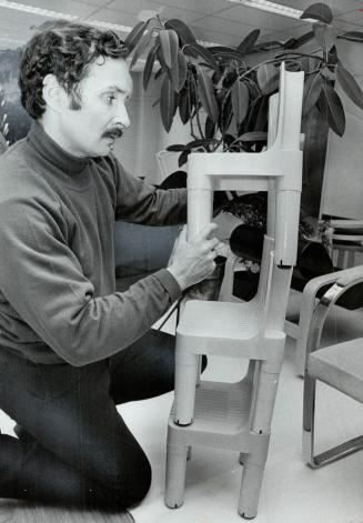 Children's chairs from Italy, Gerald Clarkes stacks the plastic chairs for show