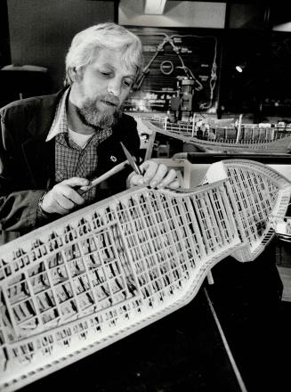 Exacting work: Ben Verburgh fashions a scale model of a sailing ship for the Hall of Transportation at the Ontario Science Centre