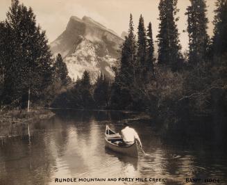 Rundle Mountain and Forty Mile Creek, Banff 11004 [man canoeing]