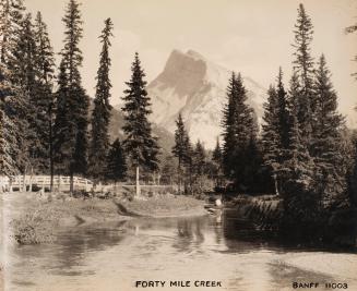 Forty Mile Creek, Banff 11003 [man canoeing]
