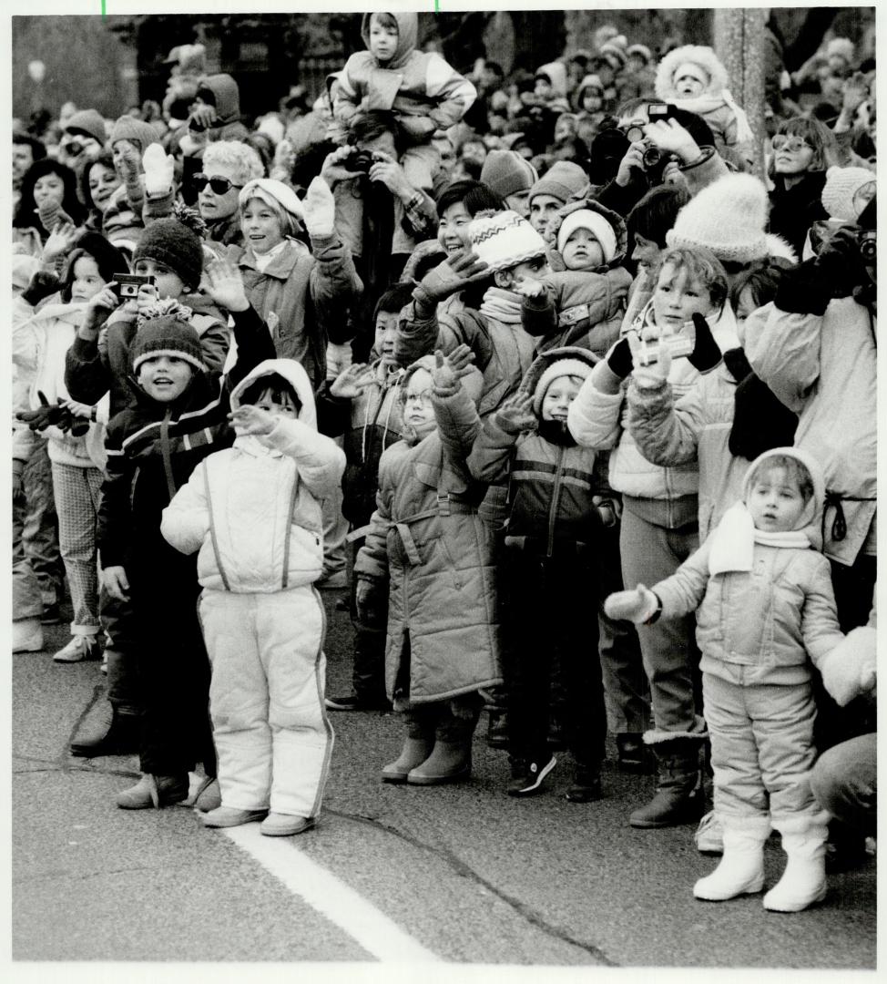 About 1,200 kids, women and men in colorful costumes, not counting the hundreds playing in bands, kept crowds cheering
