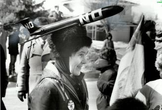 Colorful: Brenda Davies wore a protest plane on her head, others painted POP's symbols on their foreheads