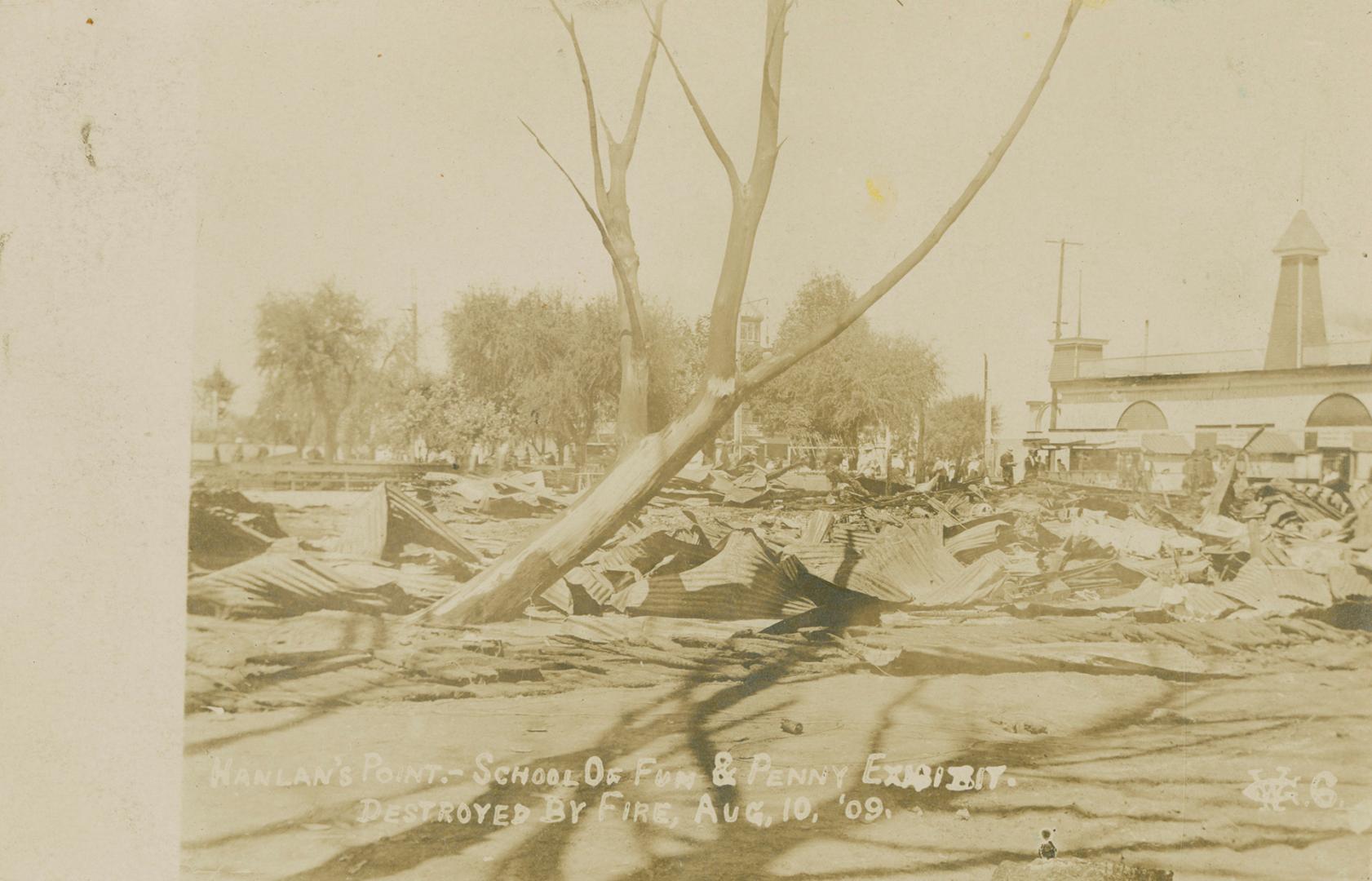 Black and white picture of an amusement park after a fire.
