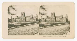 Pictures show a long shot of a large university building with a road in front of it.