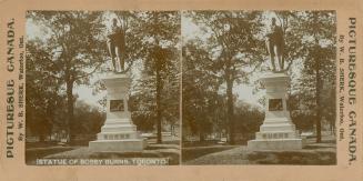 Pictures show a statue on top of a marble pedestal in a park.